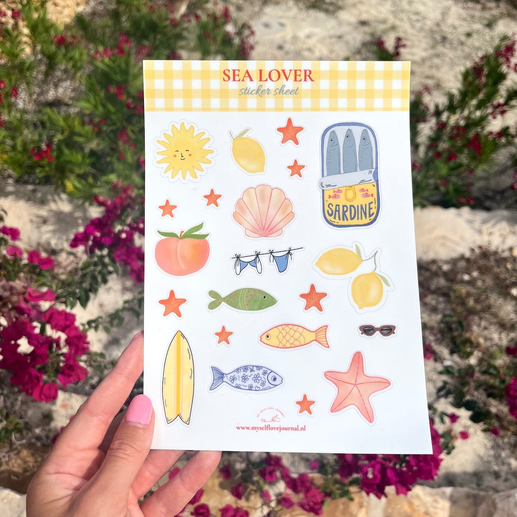 Stickervel in A5 formaat met schelpen, vissen, citroenen en andere zeedieren