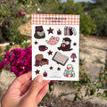 A6 Stickervel met schattige otter, beetje, gans die lezen en boeken, kaarsen, sterren, thee en nog meer cozy dingen
