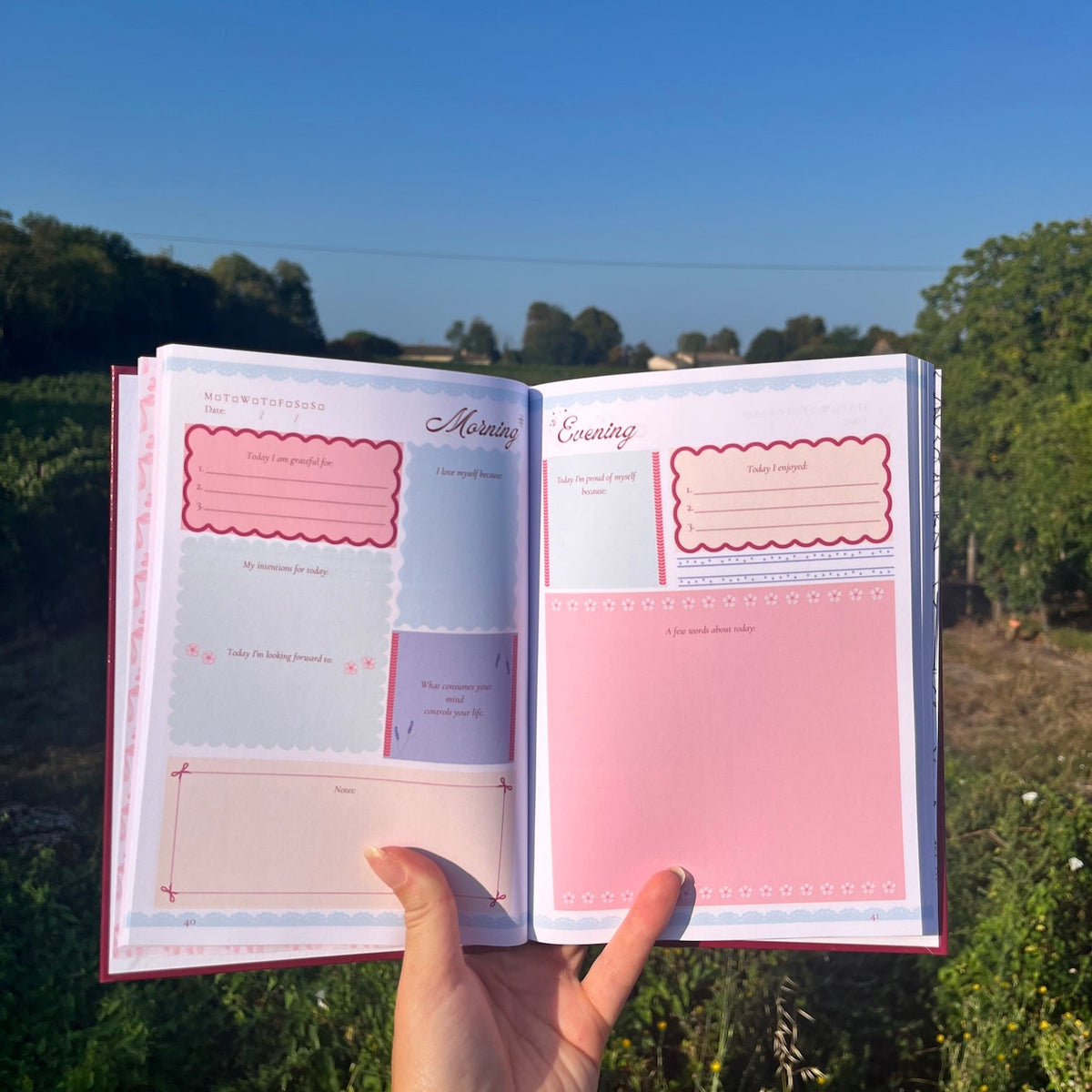 Daily pages of the my Self-Love Journal with daily questions