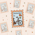 Sticker van een postzegel van Amsterdam met een fiets en tulpen.